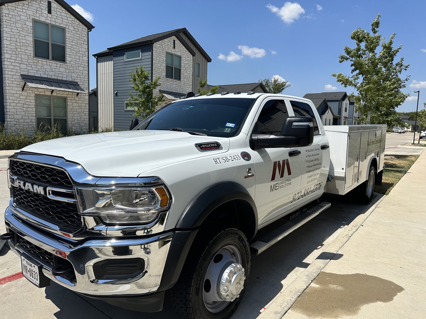 The same RAM 4500 work truck after detailing, glossy paint, clean chrome and wheels