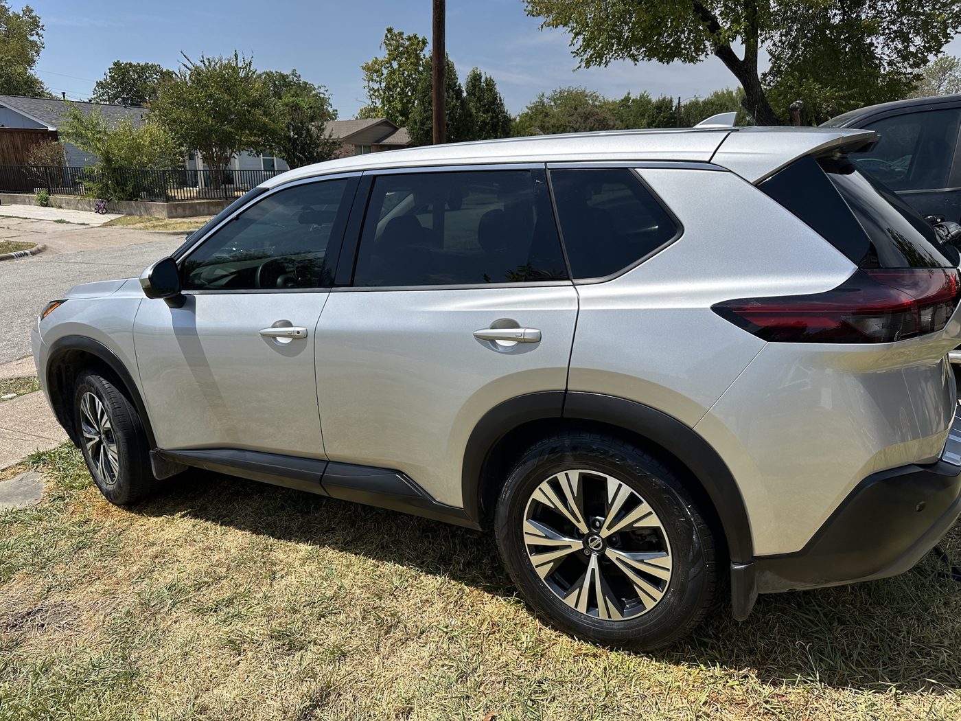 Silver Nissan Rogue SUV gleaming after an Ace Detailing exterior detail